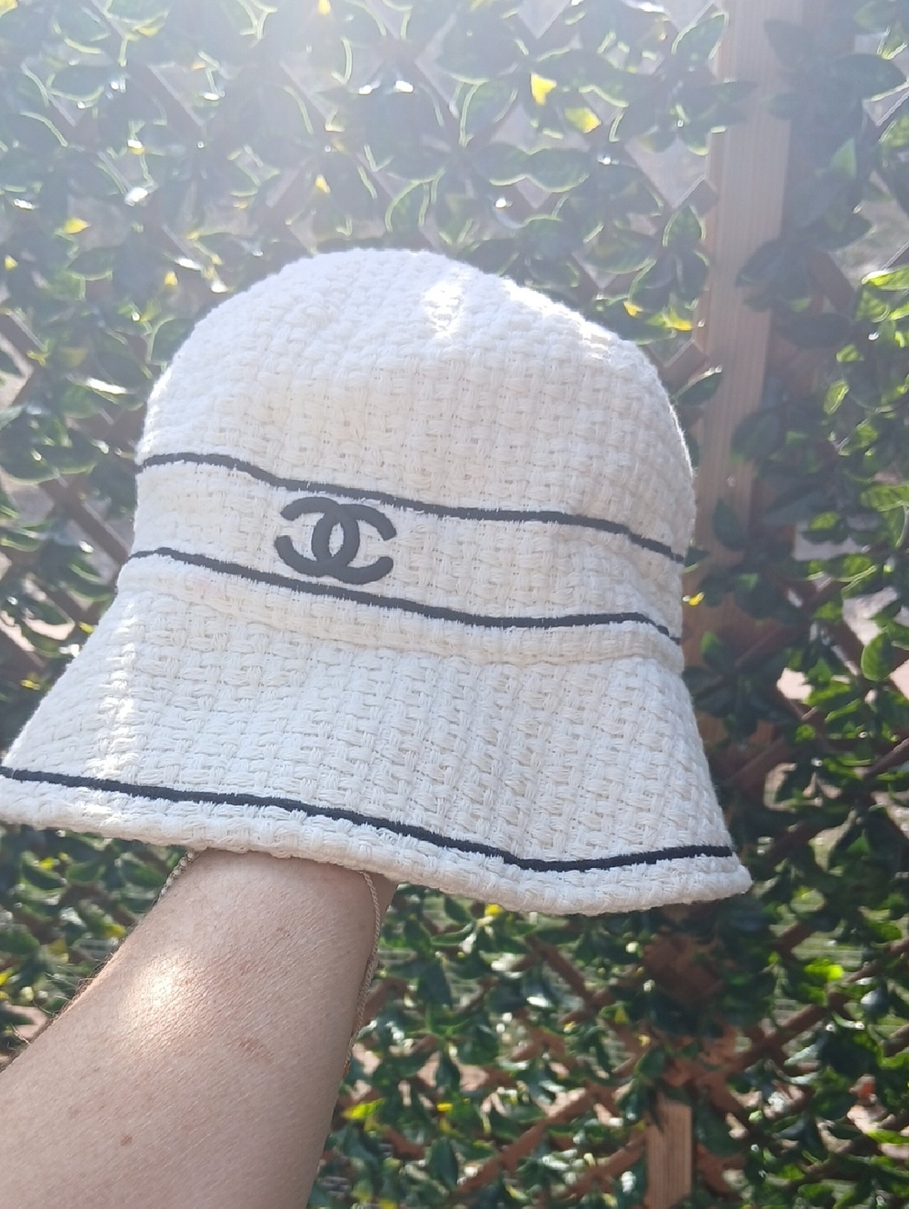 CHANEL White Tweed Bucket Hat with Black Stripe and CC Logo